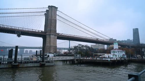 Brooklyn Bridge tower and cables. Close view of Brooklyn Bridge stone tower