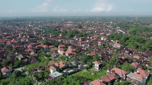 Aerial Shot of Villas in Palm Trees Jungle Rainforest Village in Ubud Bali Indonesia
