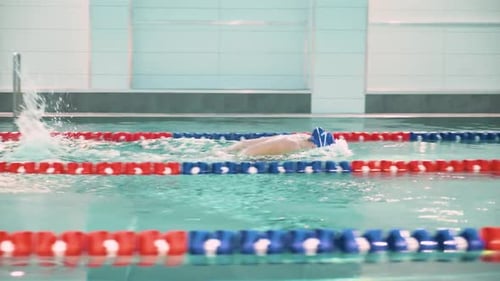 Handheld Water Sports Traning for Competitions Woman Professional Swimmer in the Pool Sporty Woman
