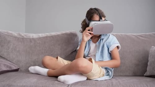 Boy Enjoys Virtual Reality Experience at Home