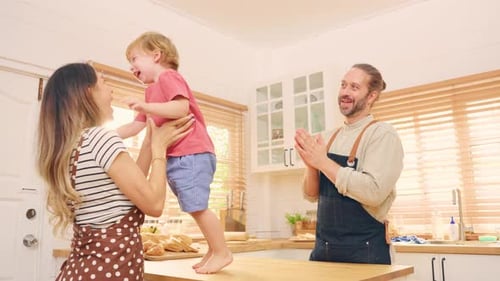 Happy Family Having Fun in Kitchen