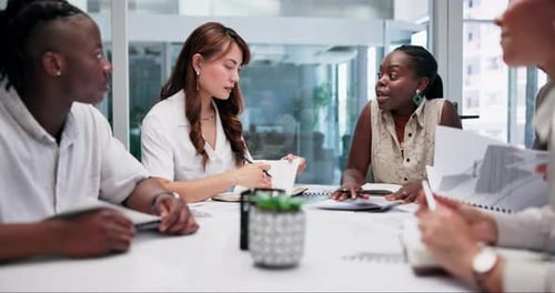 Meeting, discussion and business people with documents in office boardroom working on project