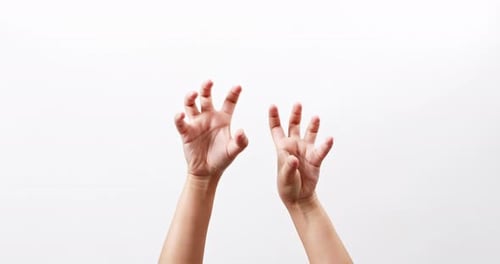 Close up of a woman's hand up and showing maul isolated on a white studio background with copy space