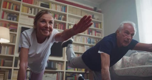 Senior Couple Working Out Together at Home
