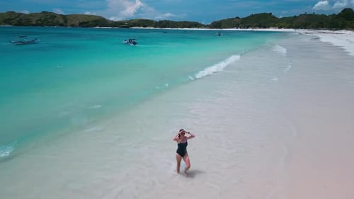 Woman Walking Shore Woman Enjoying Relaxed Walk Beside Shimmering Sea