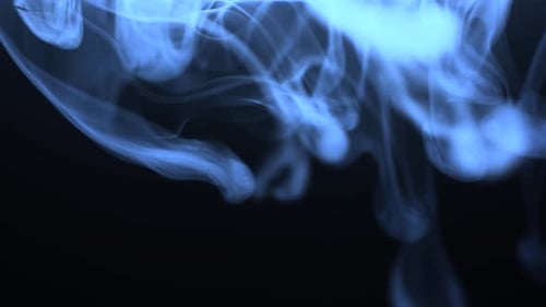 Blue Smoke Swirling in Dark Environment