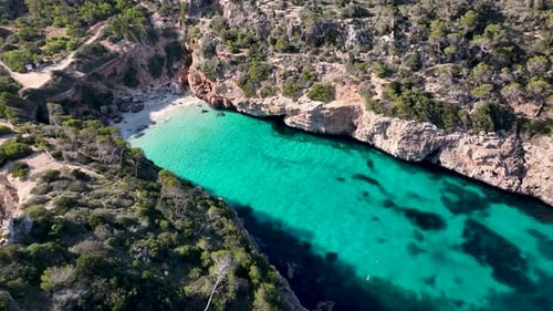 Best beach on Mallorca between cliffs with crystal clear water, Caló del Moro