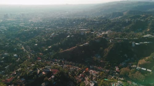 Wide Aerial Footage Over Hills and Mountains Near Los Angeles California Sunny Day Time