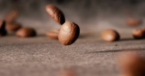 Close up of seeds of coffee. Fragrant coffee beans Super Macro Close Up. Shot on super slow motion