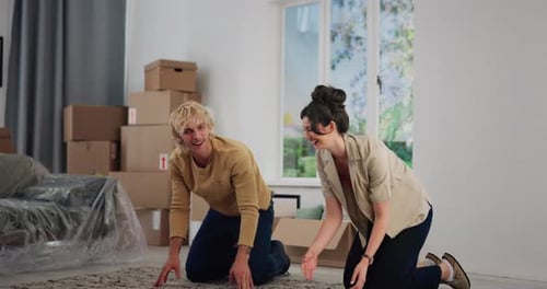 New home, high five and couple roll carpet for moving to house, property purchase and apartment