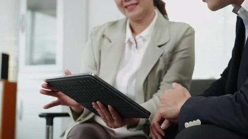 businesspeople working and brainstorming in office