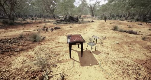 Empty Table and Chair Set in Arid Australian Landscape Under Bright Sun