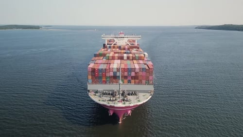 Drone Shot of a Container Ship Entering a Port in the Atlantic Ocean