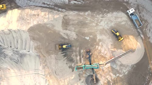 Aerial time-lapse hyperlapse of sand quarry, industrial extraction of sand for construction industry