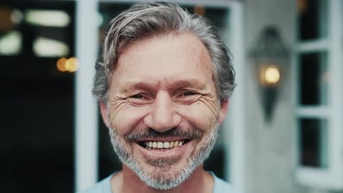 Smiling Mature Man Close Up Portrait Indoors
