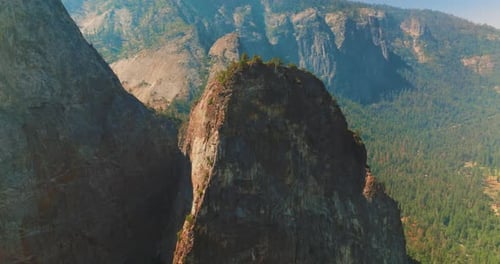 Craggy steep cliffs of Yosemite National Park, California, USA on sunny day.