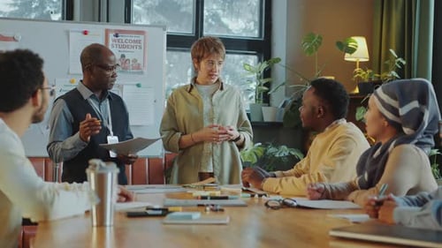 Female Student Reciting Lesson in School for Immigrants