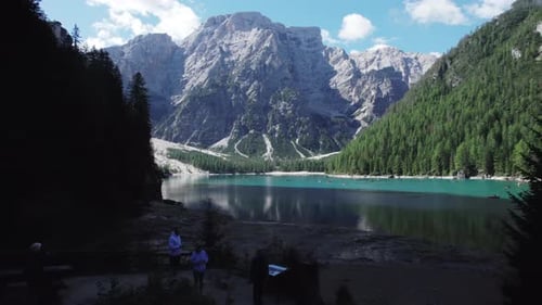 Aerial video of the landscapes in the alpine mountain lake Lago di Braies Italy