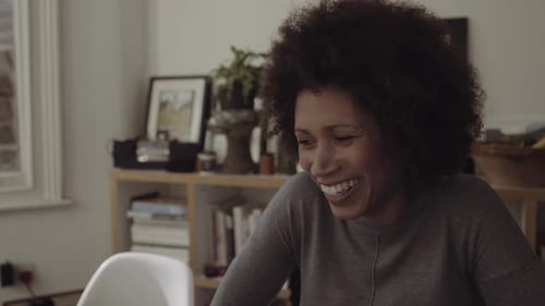 Woman and child doing arts and crafts together
