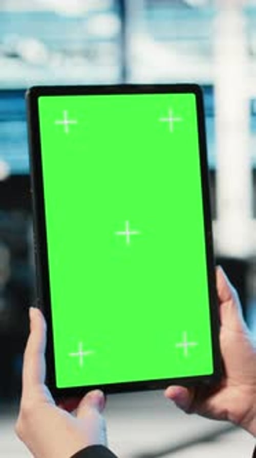 Vertical Video Green Screen Tablet Used By Data Center Admin to Optimize Server Load Balancing
