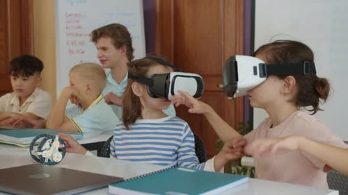 Children Using VR Headsets in a Classroom