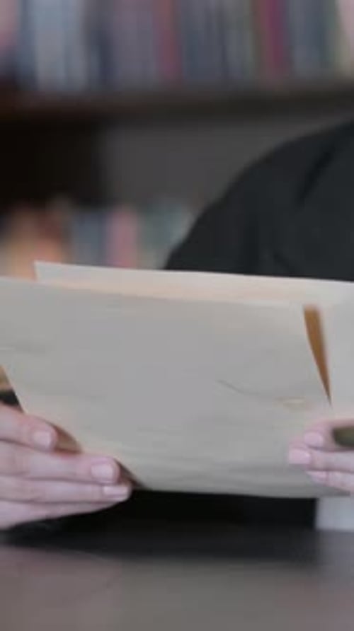 Close up of FeLawyer using Smartphone, Scale of Justice, vertical