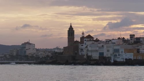 The City Skyline on Sunset Near the Water A Few Clouds on the Sky