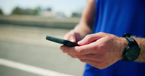 Close Up of Adult Using Smartphone Outdoors
