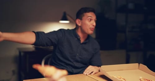 Professionals Working Late Into The Night Eat Pizza And Laugh In Modern Warmly Lit Office In The ...