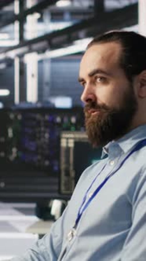 Vertical Video Software Developers Working Together in Server Farm Reviewing AI Code