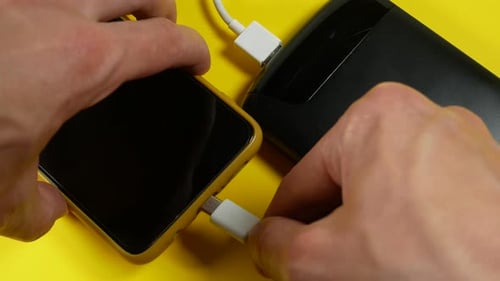 Black power bank with usb is charging