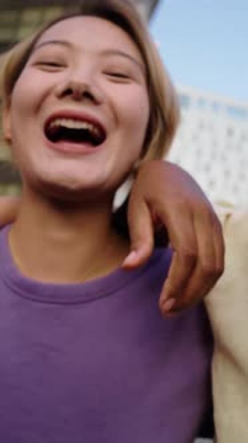 Diverse Friends Smiling and Laughing in the City