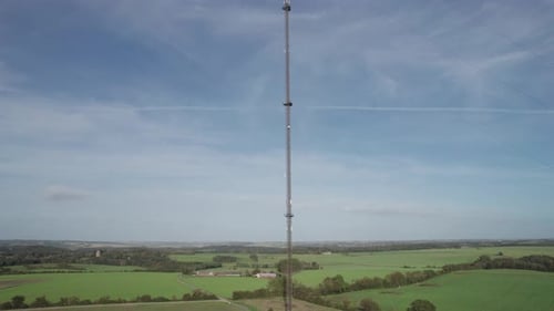 Establishing Shot, Aerial View of Telecommunication Antenna GSM, 5G Mobile Mast in Denmark - Panning