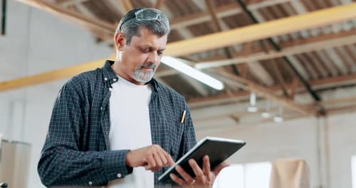 Carpentry, tablet and mature man in a workshop for online order, ecommerce and planning