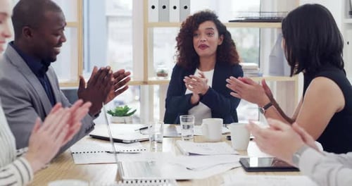 Team Celebrating Success at Office Meeting