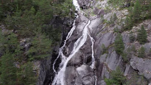 aerial view of norwegian mountains and waterfall