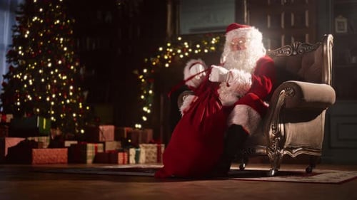Santa Claus Checking His Bag in Festive Home