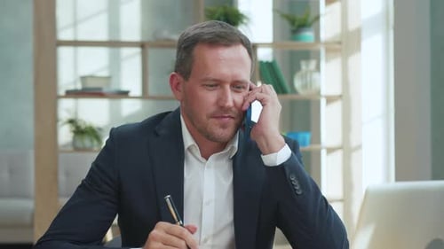 Handsome Smiling Man Talking Phone In Office Close Up. Portrait Caucasian Businessman Worker With...