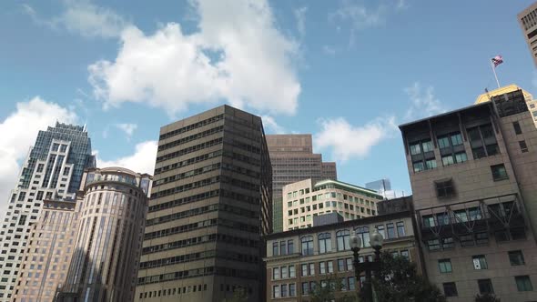 A steady shot of a group of tall buildings located in Central Boston ...
