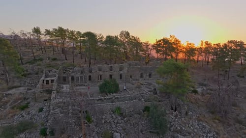 Aerial view of ancient city ruins at sunrise, Turkey.