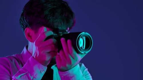 Backstage Photographer in Studio Shooting with Camera