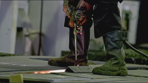 Professional Welder at Industrial Plant Stock Clip Worker Carries Out Welding Work at Metalworking