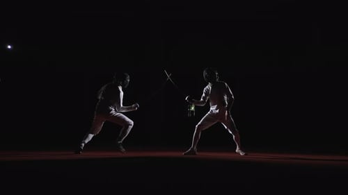 Duel Of Professional Fencers Rivals Swordsmen Practicing And Fighting In Fencing Track Slow Motion