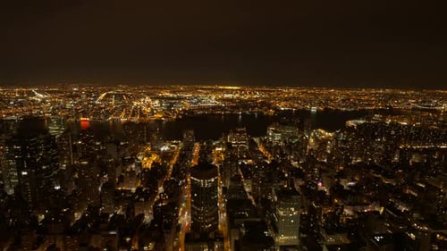 A Stunning Night View of a Cityscape Beautifully Illuminated By Sparkling City Lights
