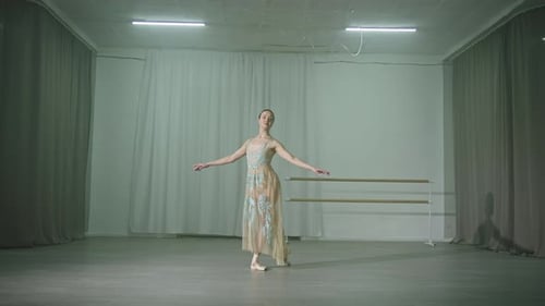 Beautiful Caucasian Ballerina Dancing in the Hall