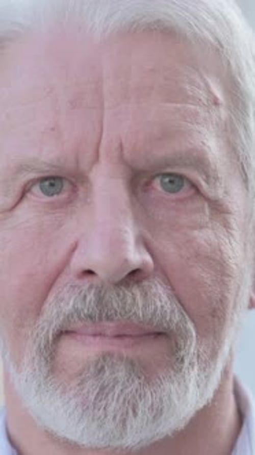 Close Up of Serious Old Man Outdoor, Vertical Video