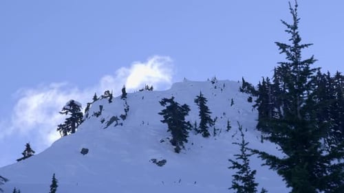 Forest Mountains Covered With Snowscape During Winter In Ski Resort. Low Angle