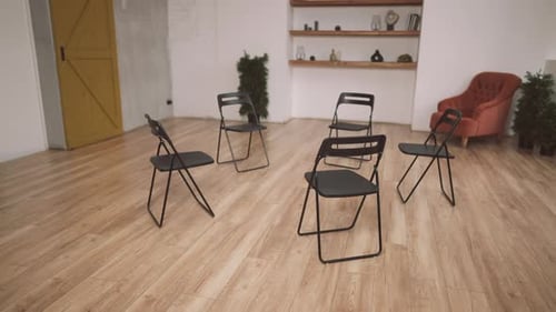 Empty Room for Group Therapy in Psychological Clinic Chairs Standing in Circle Support Mental Health