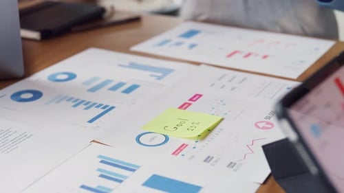 Asia people meeting brainstorming ideas about new paperwork project in office.