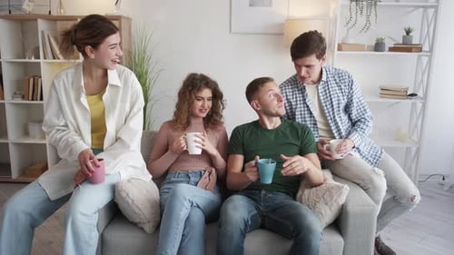 Friends Relaxing at Home Together